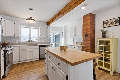 Welcome to 675 River Road, a rare riverside property set on - photo 11