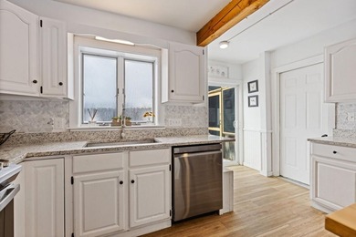 Welcome to 675 River Road, a rare riverside property set on - photo 12