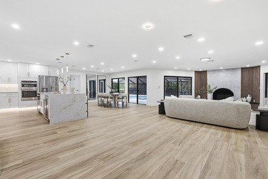 Welcome to 8862 Wendy Lane S, a fully reimagined and completely - photo 2
