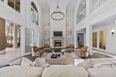 COMPLETELY RENOVATED ESTATE COMMANDING MAIN-LAKE VIEWS IN A - photo 14