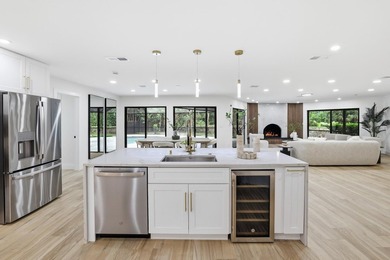 Welcome to 8862 Wendy Lane S, a fully reimagined and completely - photo 4