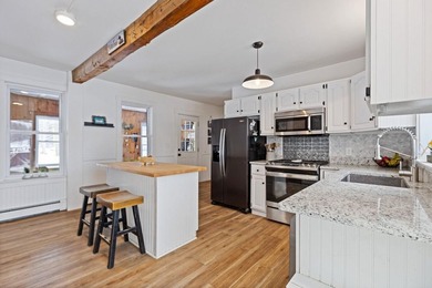 Welcome to 675 River Road, a rare riverside property set on - photo 15