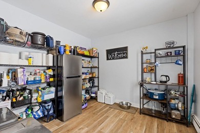 Welcome to 675 River Road, a rare riverside property set on - photo 16