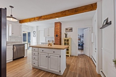 Welcome to 675 River Road, a rare riverside property set on - photo 17