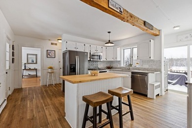 Welcome to 675 River Road, a rare riverside property set on - photo 18