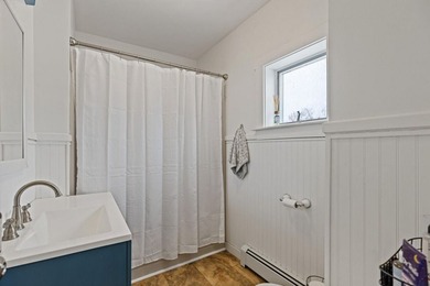 Welcome to 675 River Road, a rare riverside property set on - photo 21