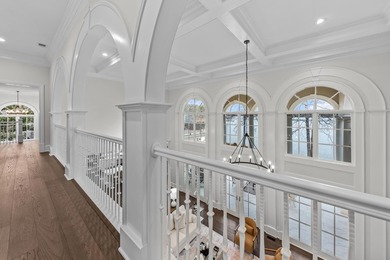 COMPLETELY RENOVATED ESTATE COMMANDING MAIN-LAKE VIEWS IN A - photo 38
