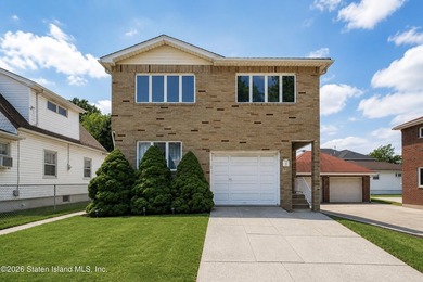 Welcome to 14 Martin Avenue! This spacious detached two-family - photo 1