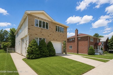 Welcome to 14 Martin Avenue! This spacious detached two-family - photo 2