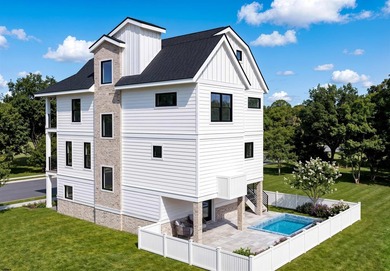 BEST DEAL ON THE ISLAND! Discover elevated coastal living in - photo 2
