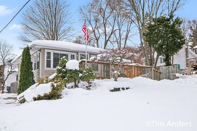 Bostwick Lake Home For Sale in Rockford Michigan