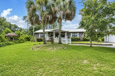 Ranch Style brick home, 3/2 with small pool on two private lots - photo 1