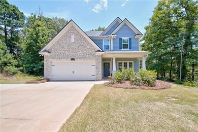 Savor the serenity of nature in your lakefront property in your - photo 2