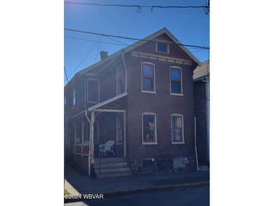 This city duplex is ready for new ownership with two separate - photo 2