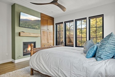 Stunning 4-Bedroom, 3-Bath home with Lake & Ski Slope Views in - photo 14