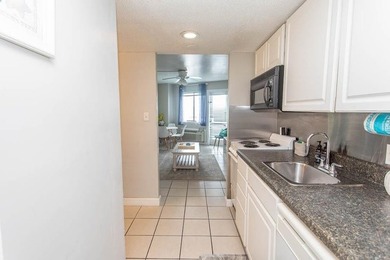 This one-bedroom condo comes fully furnished. It is perfect as a - photo 7