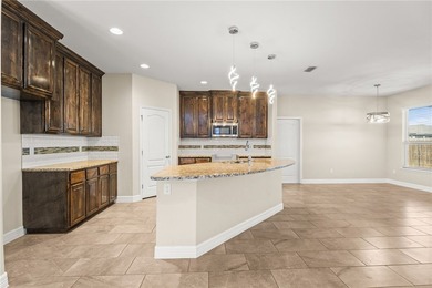 Stunning three-year-old home on a desirable corner lot featuring - photo 11