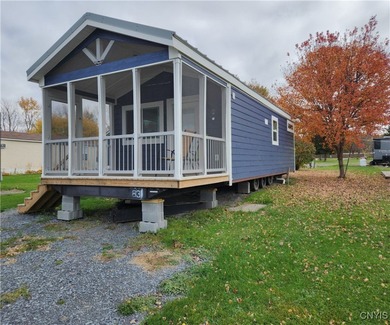Discover this brand-new, turnkey mobile lakeside retreat - Lake Home For Sale in Adams, New York