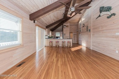 Experience exceptional coastal living in this stunning 8-bedroom