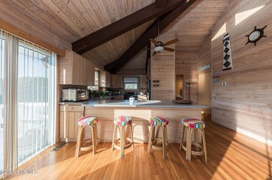 Experience exceptional coastal living in this stunning 8-bedroom