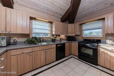 Experience exceptional coastal living in this stunning 8-bedroom