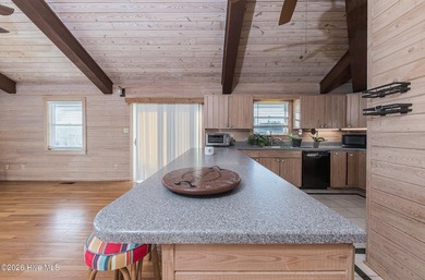 Experience exceptional coastal living in this stunning 8-bedroom