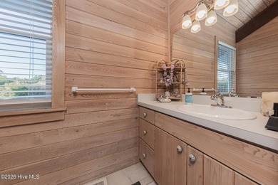 Experience exceptional coastal living in this stunning 8-bedroom