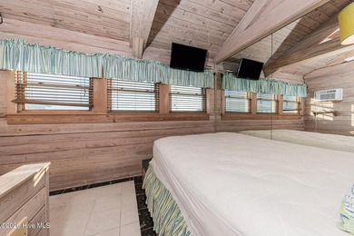 Experience exceptional coastal living in this stunning 8-bedroom