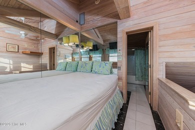 Experience exceptional coastal living in this stunning 8-bedroom