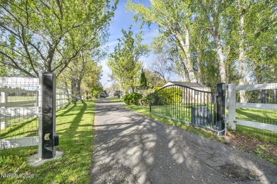 Behind a private tree lined drive in Holcomb Ranch lies a rare - photo 3