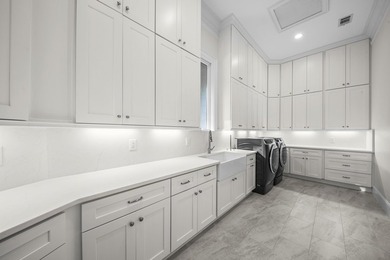 BEAUTIFULLY REMODELED LUXURY HOME POSITIONED ON ONE OF THE MOST - photo 24