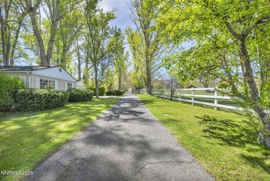 Behind a private tree lined drive in Holcomb Ranch lies a rare - photo 4