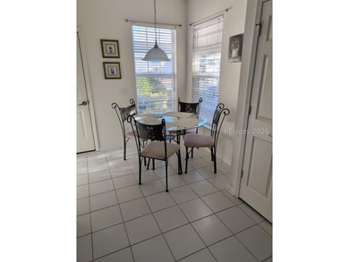 Furnished and move-in ready, this well-maintained 3-bedroom - photo 4