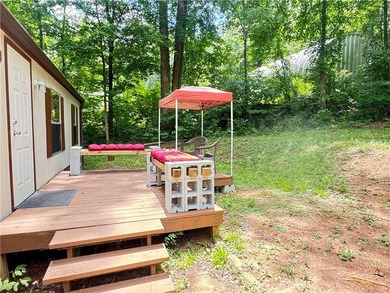 This 3-bedroom, 2-bathroom home is located on an interior lot in - photo 2