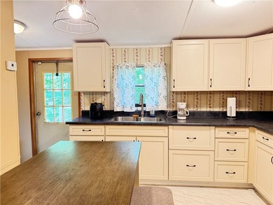 This 3-bedroom, 2-bathroom home is located on an interior lot in - photo 9