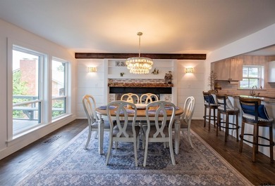 Main lake waterfront with private dock, updated interior, and - photo 6