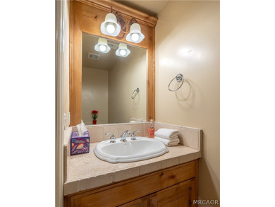 Beautifully maintained and thoughtfully designed, this spacious - photo 12