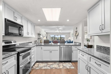 Enjoy sweeping marina, lighthouse, and Intracoastal Waterway