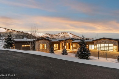 This newly completed estate sits on one of the premier homesites