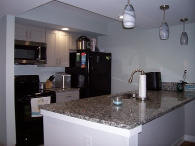 Sands Ocean Club Unit 619 is a 2 bedroom 2 bath unit that faces - photo 6
