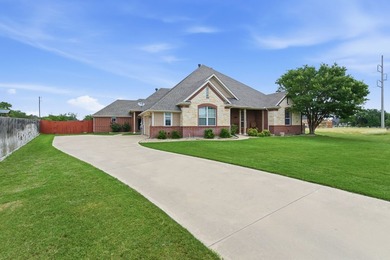 Situated on over an acre, this stunning 4 bedroom, 2.5 bath home - photo 3