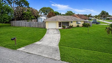 Welcome to this charming Port St. Lucie retreat! Offering rare - photo 2