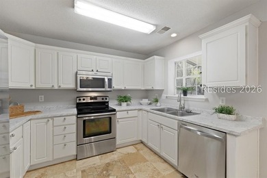 Freshly updated, this 4BR/2BA home located in The Farm offers a - photo 9