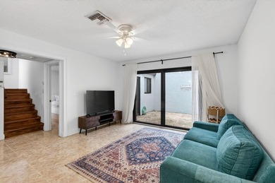 Tucked into the walkable Pineapple Walk community, this 3-bed - photo 17