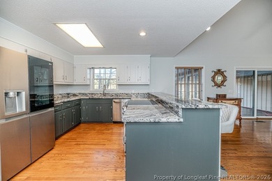 Experience golf course living at its finest in this custom-built - photo 18