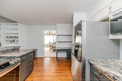 Experience golf course living at its finest in this custom-built - photo 19