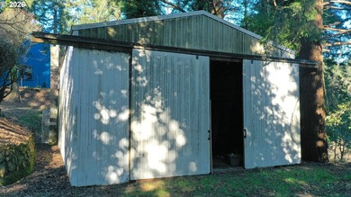 Tucked away on 4.98 private acres just minutes from downtown - photo 26