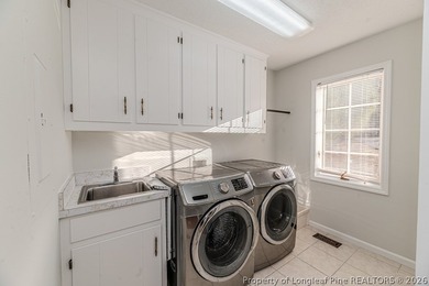 Experience golf course living at its finest in this custom-built - photo 39
