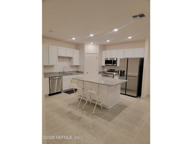 This 3-bedroom, 2 1/2 bathroom townhome is practically brand new - photo 3