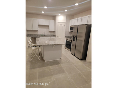 This 3-bedroom, 2 1/2 bathroom townhome is practically brand new - photo 6